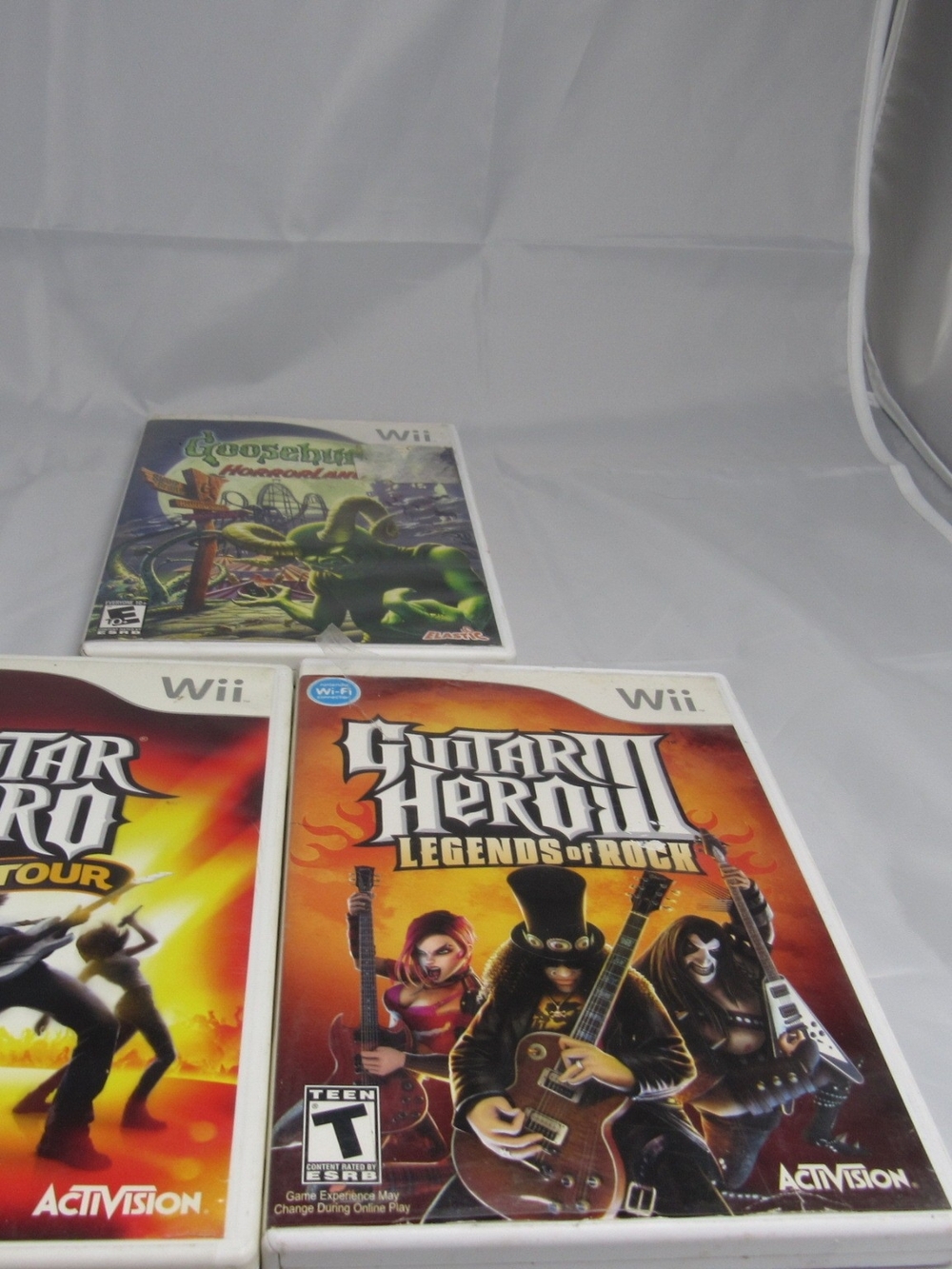 Wii  Games: Guitar Hero World Tour, Guitar Hero III Legends of Rock,  Goosebumps